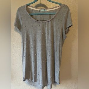 Maurice’s grey top with rhinestone and metal embellishments, large